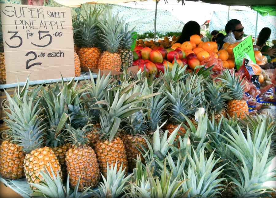 mixed tropical fruits for sale at a Hawaii farmers market