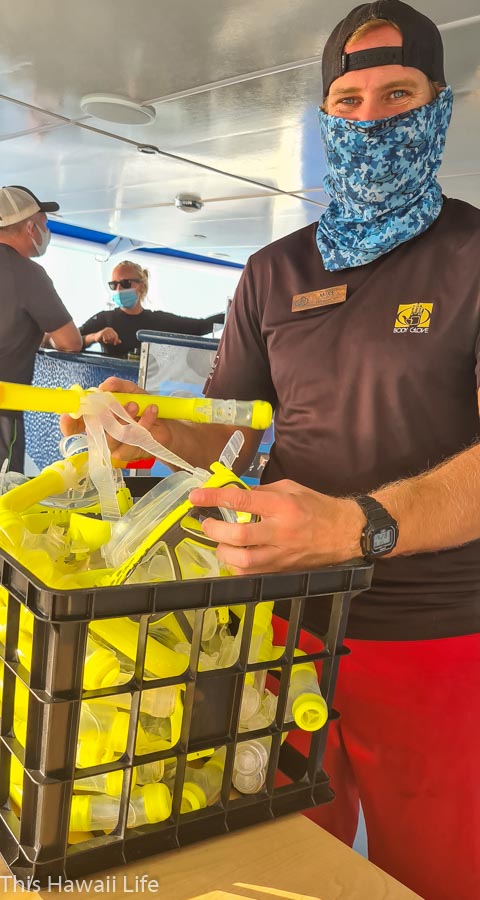passing out snorkeling sets for the snorkel kona experience