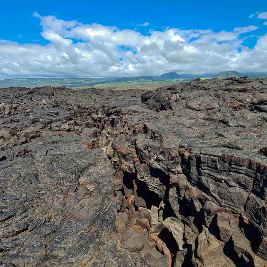 Lava cracks along the lava fields hiking to Kamehame Beach from Punalu'u