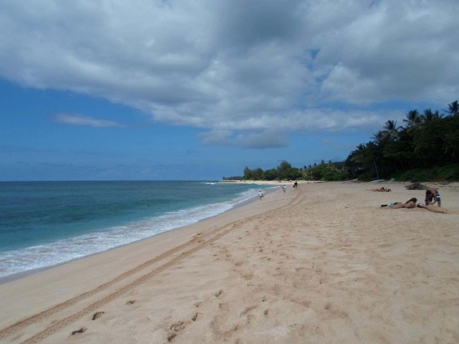Summer time conditions and calm waters at Ehukai Beach